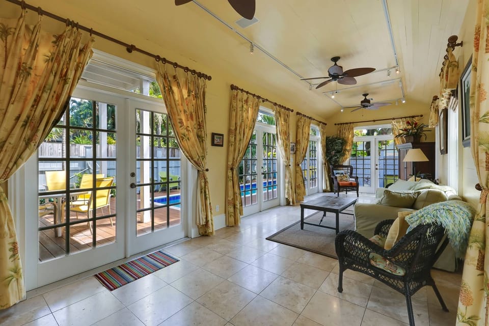 French doors open to the backyard.