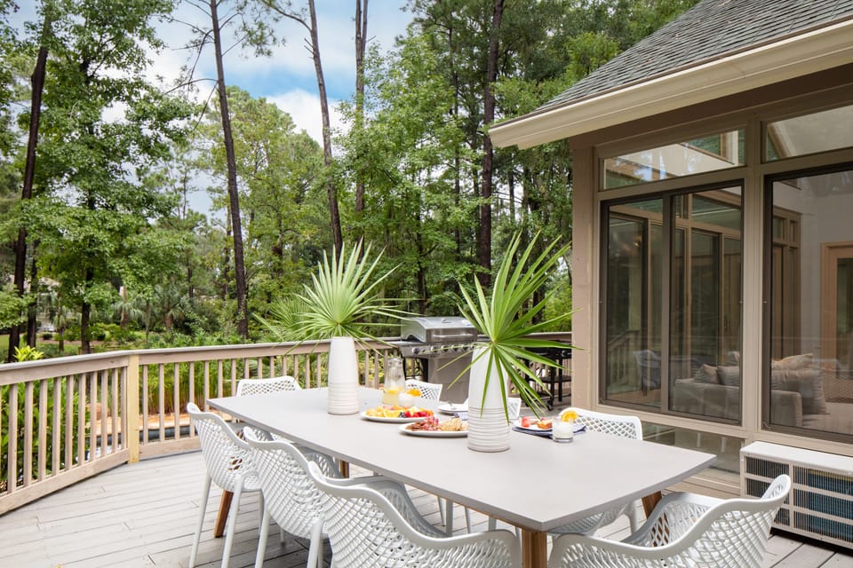 Outdoor dining table seats eight for al fresco meals.