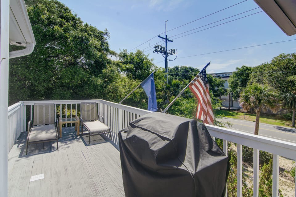 Deck with gas grill.