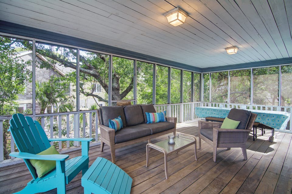 Spacious screen porch off the kitchen.