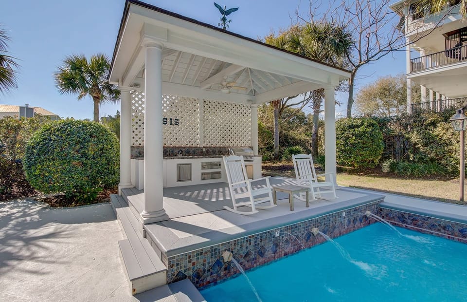 Outdoor kitchen by the pool.
