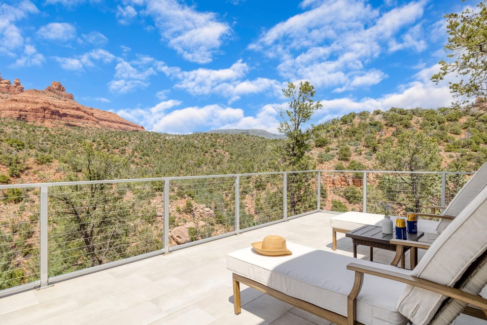 Sun loungers with mountain views.