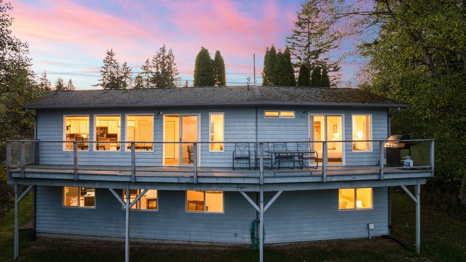 Exterior featuring a large wrap-around deck.