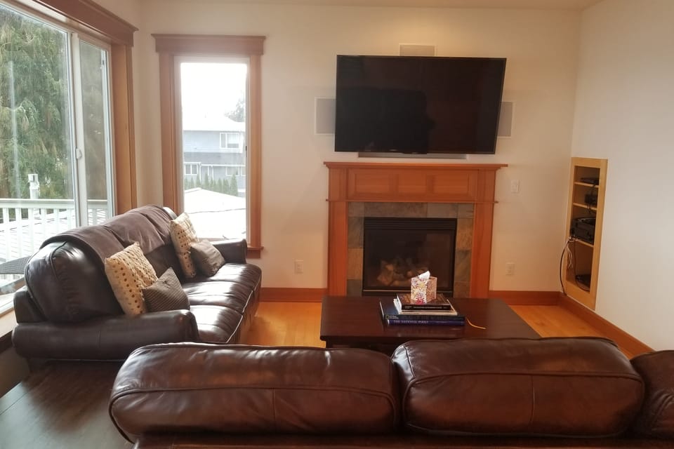 Relaxing in style in our inviting living space with a fireplace.