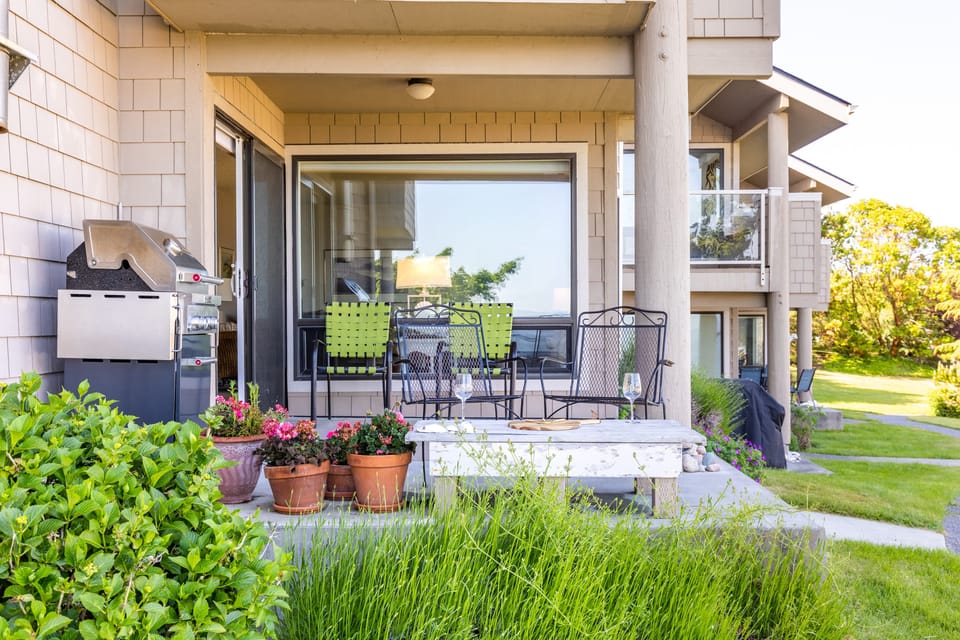 Charming private patio with ocean views.