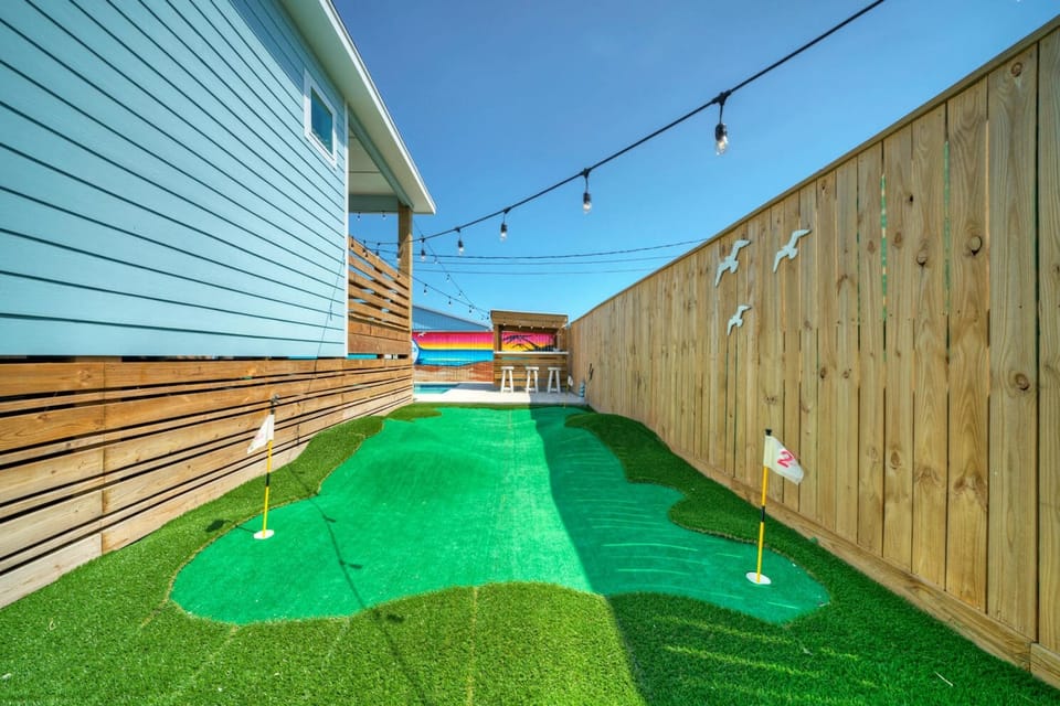 Perfecting my short game on the putting green.