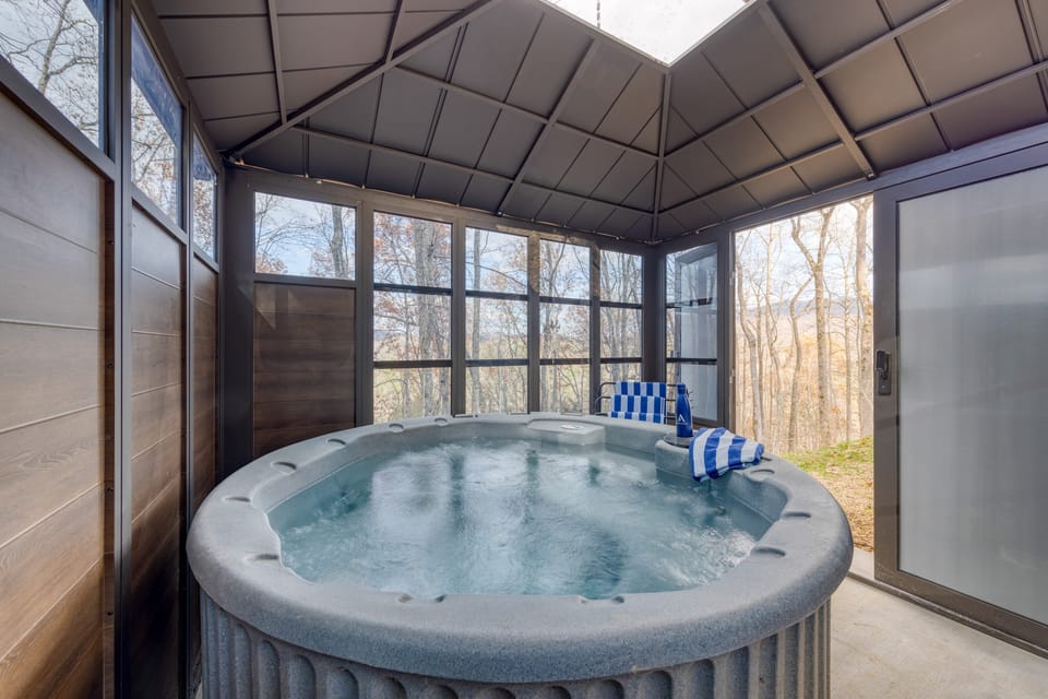 Hot tub is within a unique metal cabana to keep you extra warm.