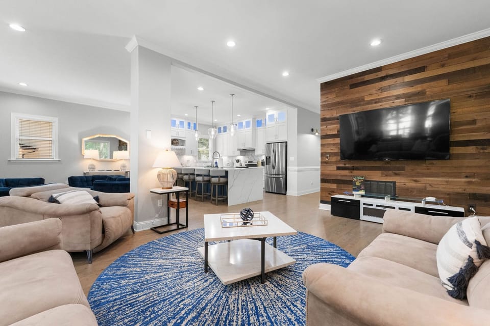 Kick back and watch a movie in the modern open concept main level living.