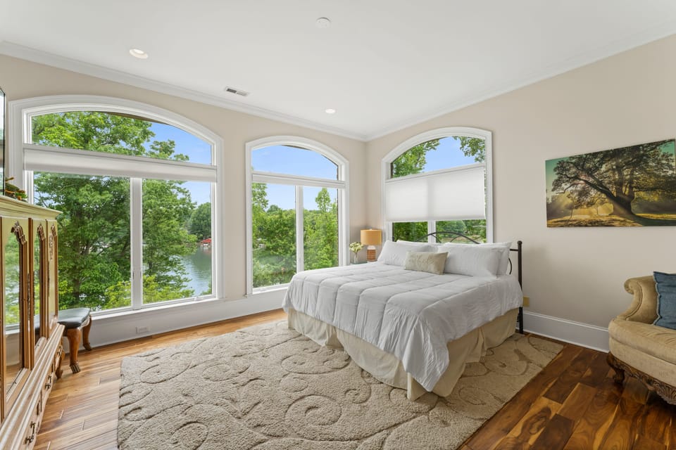 Upper Level King bedroom with TV and great lake views.