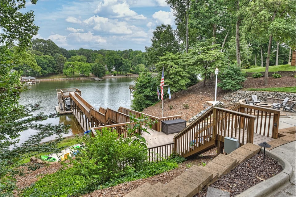Exquisite stone patios and recently updated decking throughout the entire property.