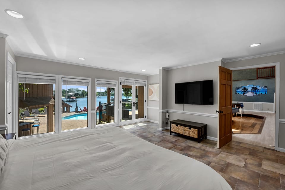 Master Bedroom - main level - king bed, amazing views of the lake &amp; full attached bathroom.