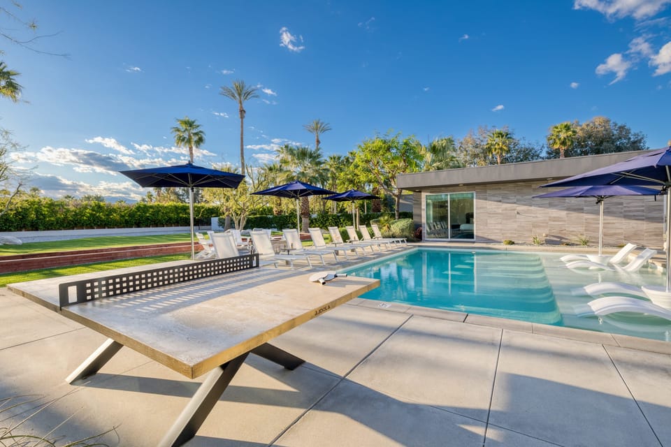 Ping pong table on the poolside patio.