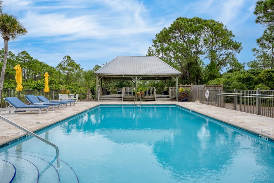 Access to community pool, hot tub, and shaded cabana.