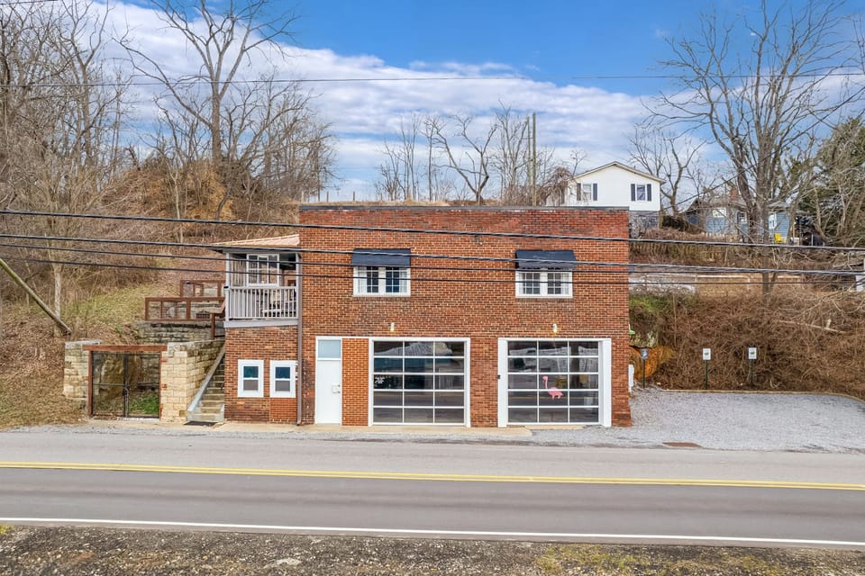 Industrial-inspired architecture with a brick exterior and chic design inside.
