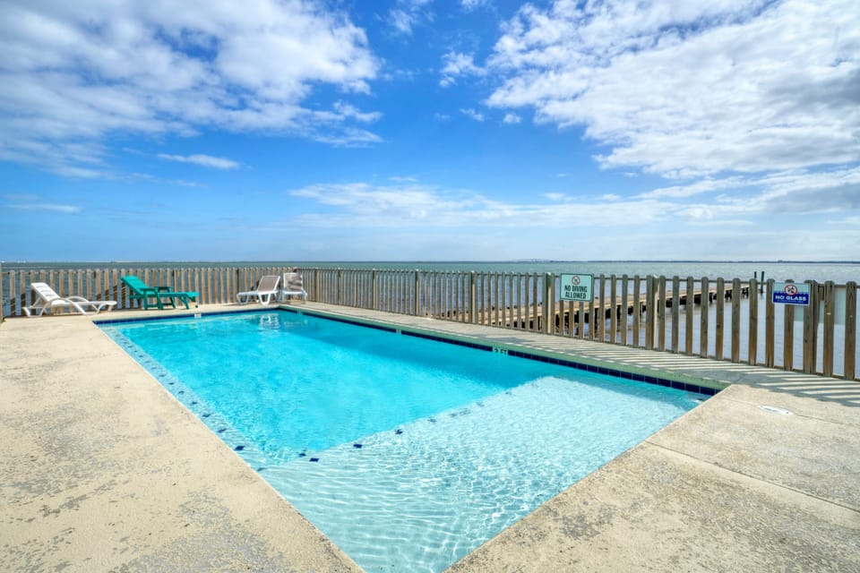Relax at the waterfront community pool.