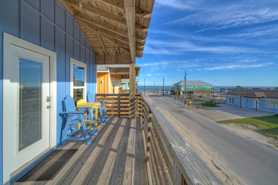 Relax on the balcony and enjoy the ocean breeze.