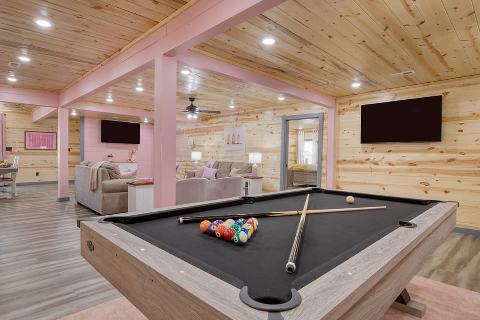 Pool table, lounge seating, and TVs for laid-back nights in.