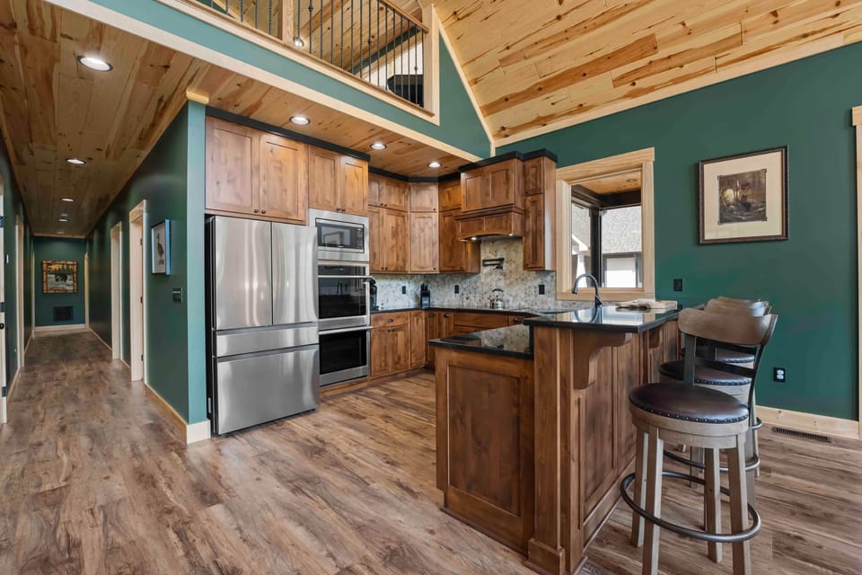 Kitchen is fully equipped and features high-end appliances.