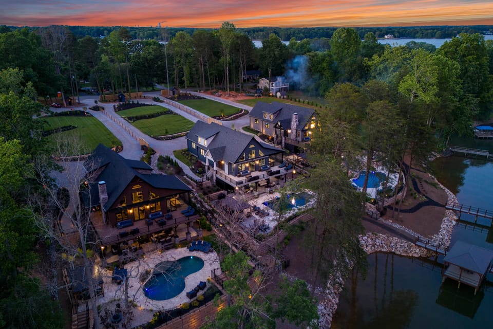 Gray Fox backyard with plenty of seating options, pool, grill, pergola and fire pit.