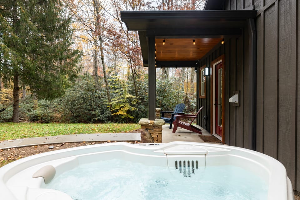 Relax and unwind in the private hot tub.