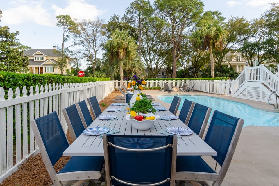 Dine alfresco at the spacious outdoor dining table.