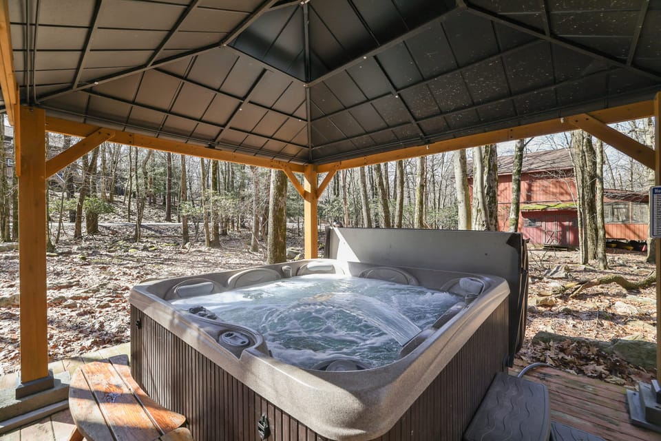 Hot tub nestled in the woods.