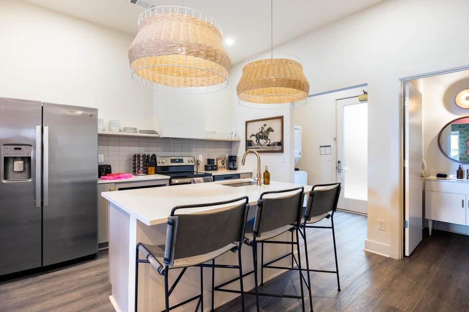 Fully equipped kitchen with a full suite of stainless steel appliances.