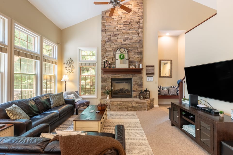 Spacious living room featuring a fireplace perfect for relaxation.