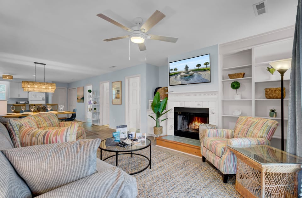 Cozy living room with a fireplace and TV.