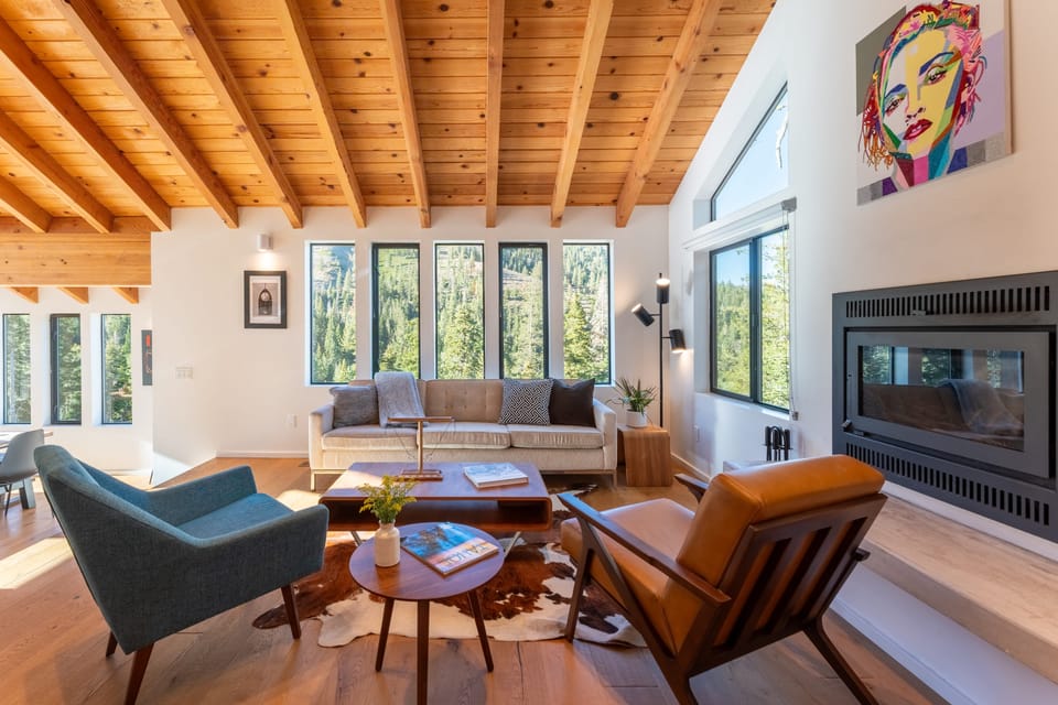 The living room features a fireplace.