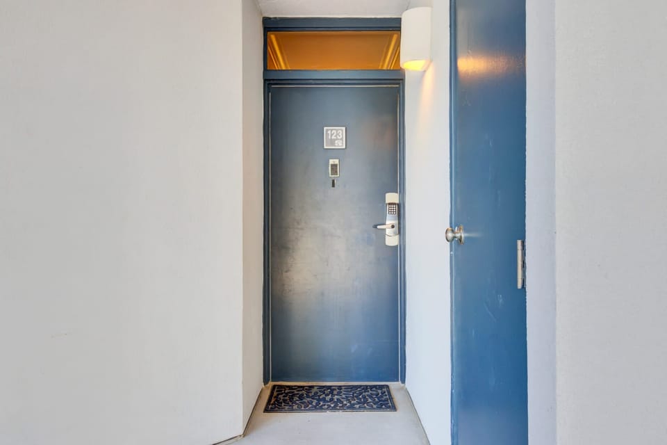 Bedroom 2 features a Queen bed.