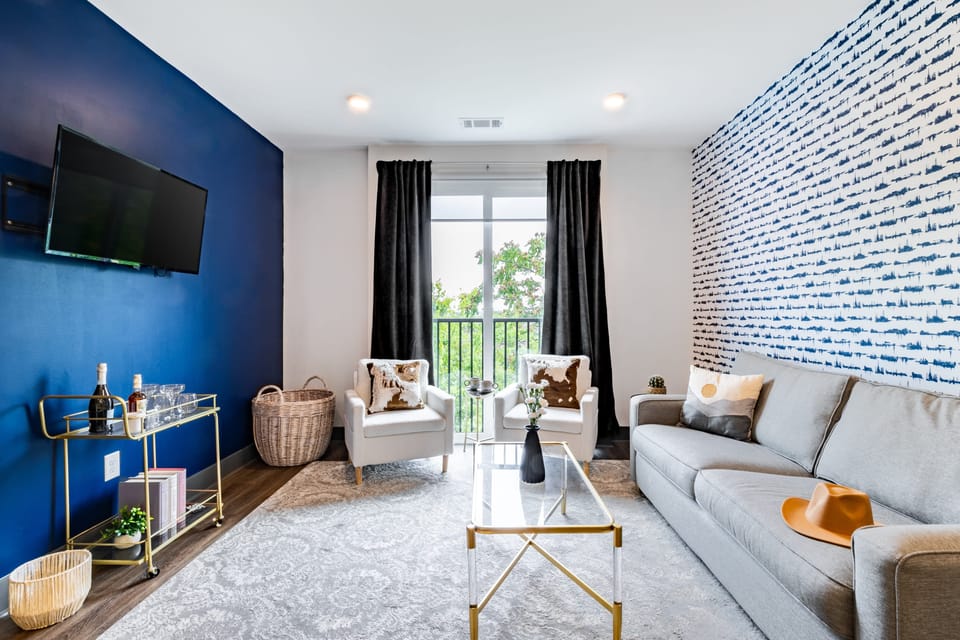 Comfortable seating and TV in the living room.