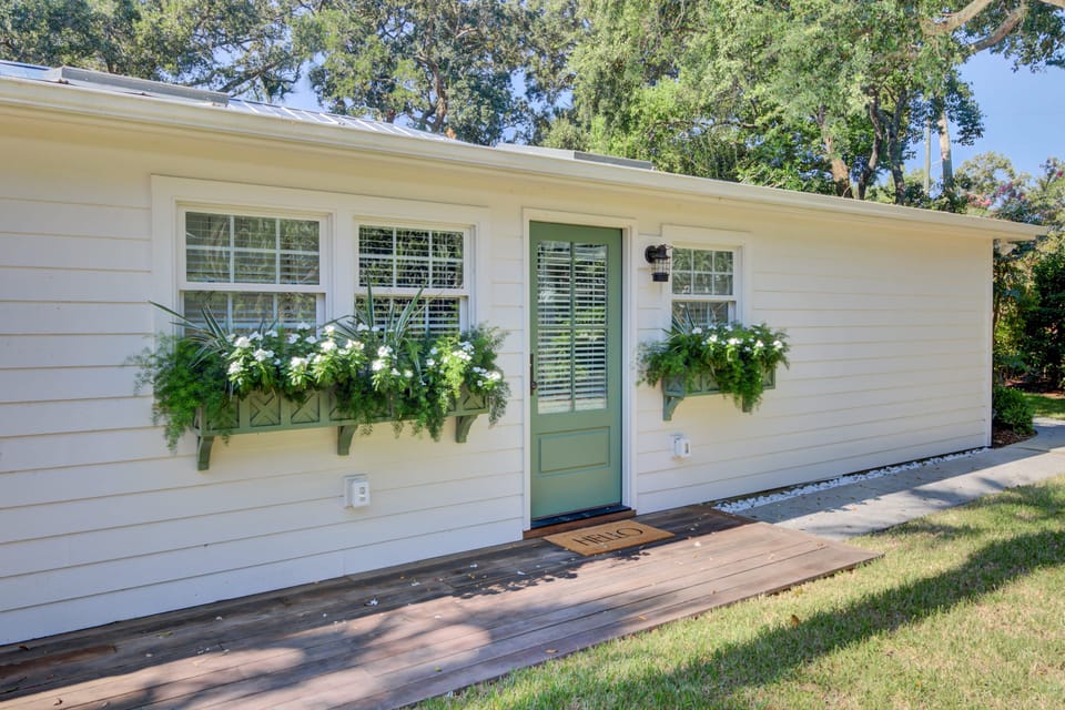 Primary bedroom features a king bed, TV, and ensuite bathrooom.