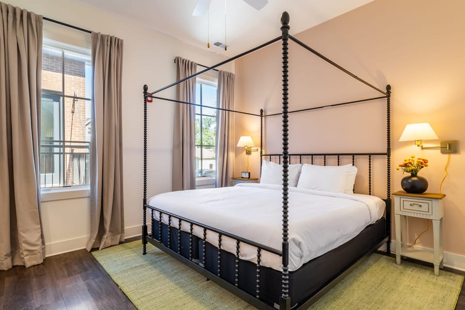 The primary bedroom offers a queen-sized bed.