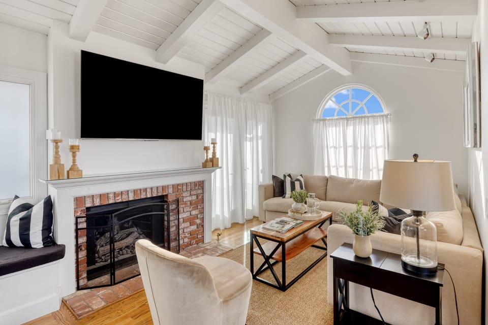 Upstairs living area is one of two comfortable living spaces.