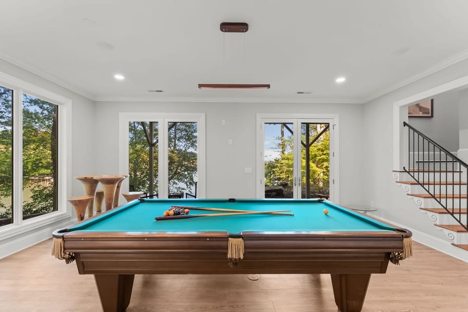 Lower Level Pool room with great lake views and TV.
