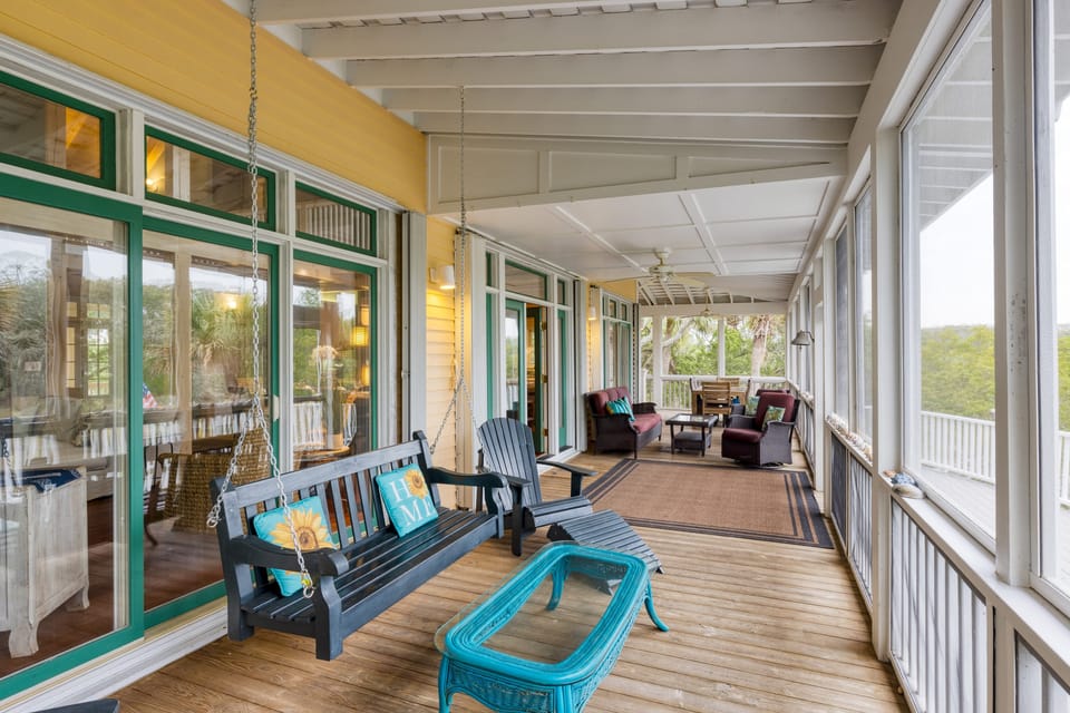 Spacious balcony and deck with plenty of outdoor seating.