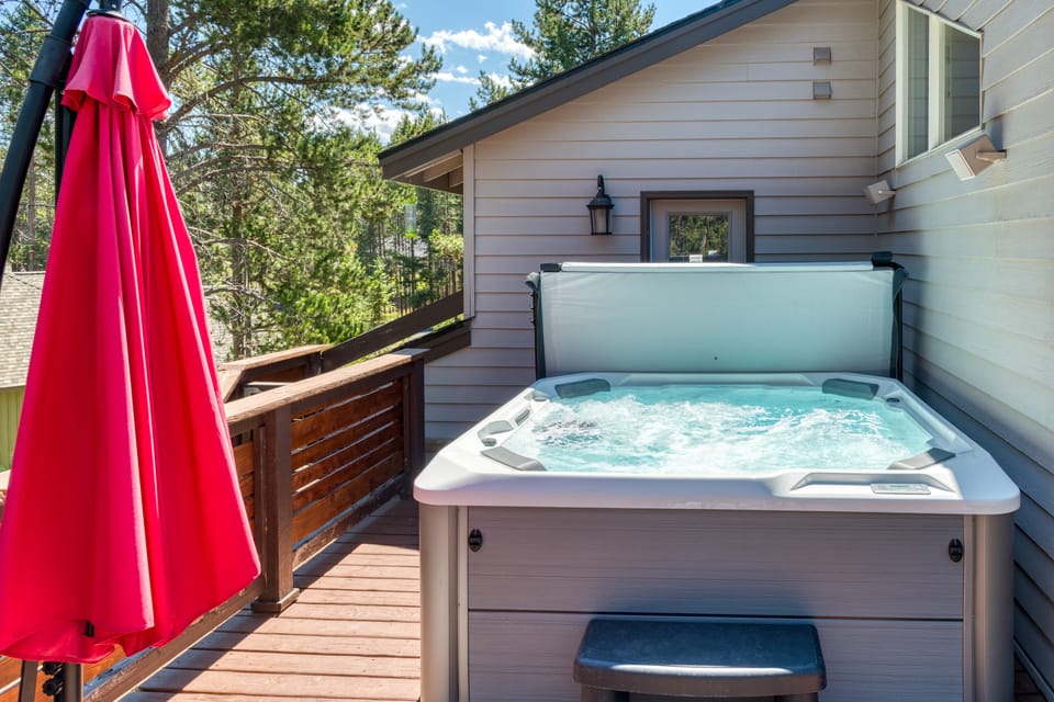Soak up the sun in your private hot tub.