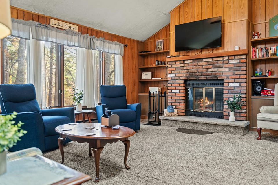 Fireplace and tons of natural light in the living room.