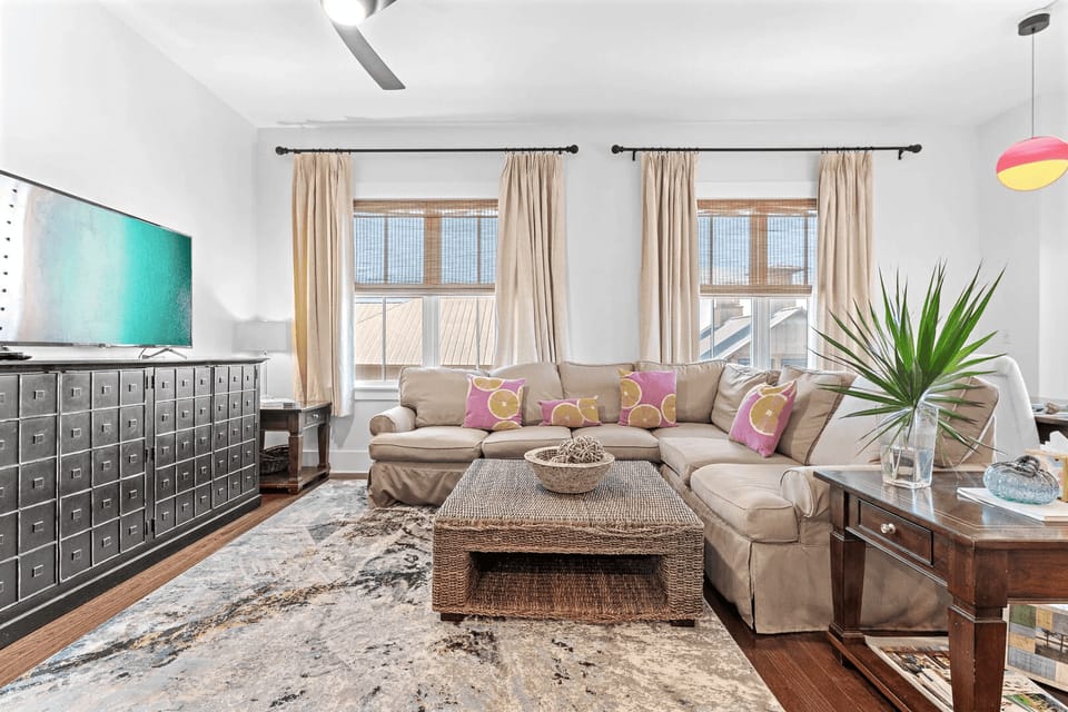 Large sectional sofa and TV.