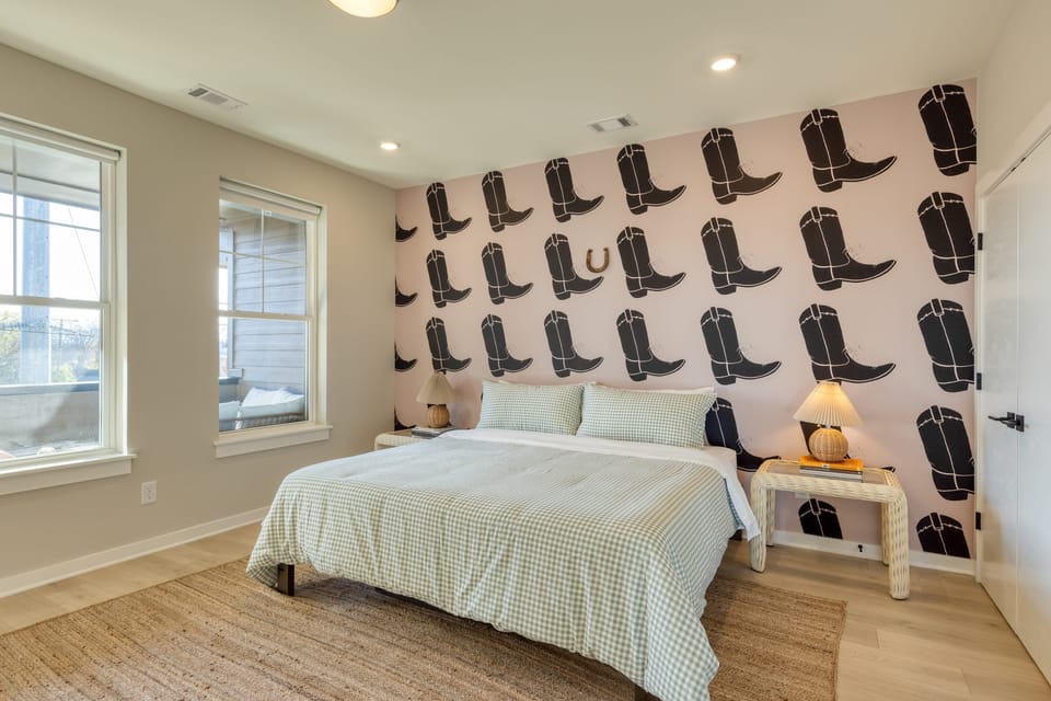 Primary bedroom features a king bed and ensuite bathroom.