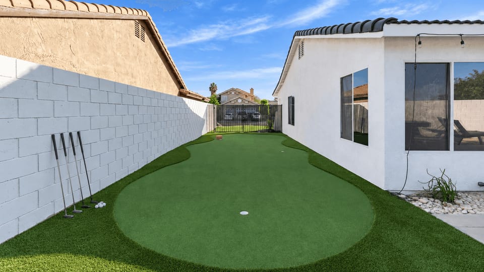 Practice your swing and perfect your game on the private putting green.