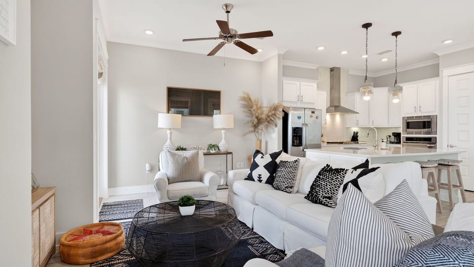 Bright, breezy, and made for relaxing—an open-concept living space with a stylish kitchen just steps away.