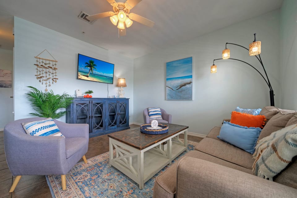 Coastal-inspired décor, plush seating, and a sleeper sofa.