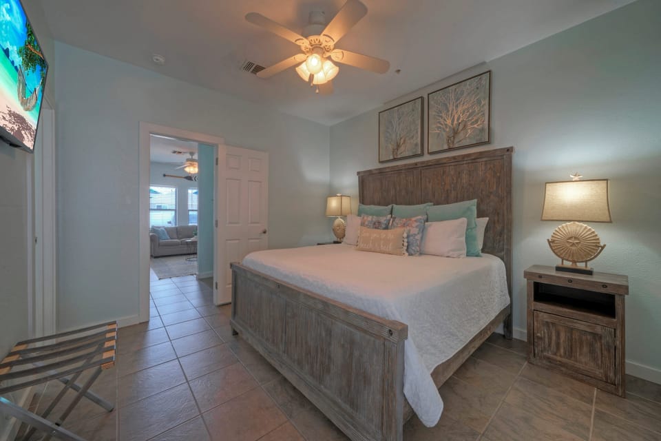 The bedroom features a king bed and an ensuite bathroom. (Costa Bahia 105)