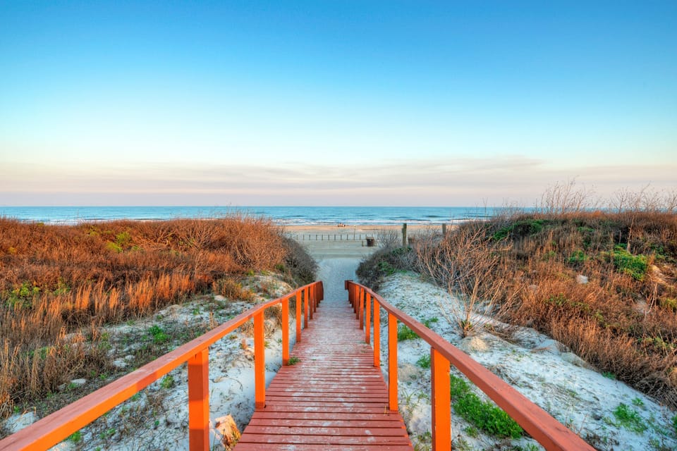 Boardwalk directly to the beach.
