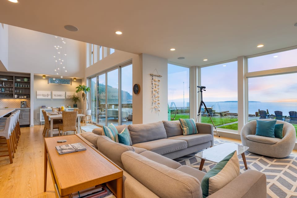 Huge windows bring water views inside.