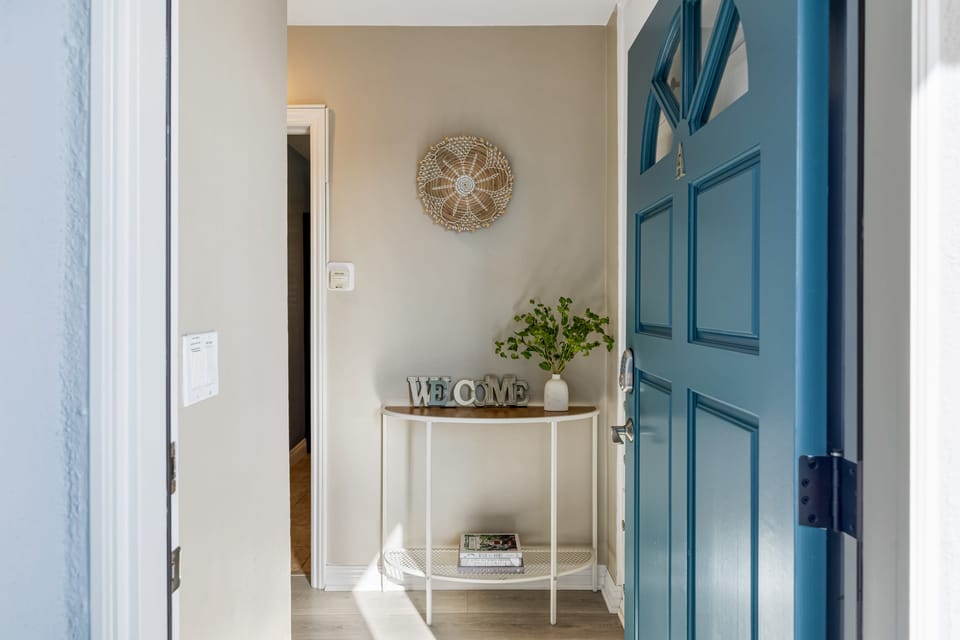 Welcome to your upstairs coastal retreat – Unit A awaits!