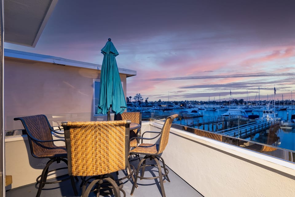 Private balcony overlooking the tranquil waterfront.