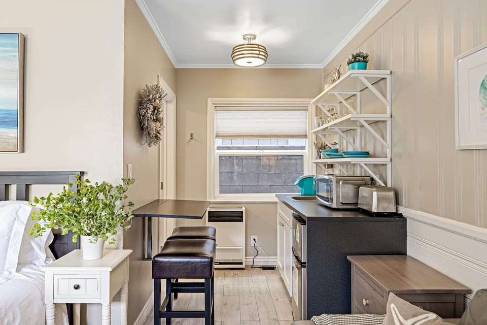 Full private bathroom with a clean and shower setup.